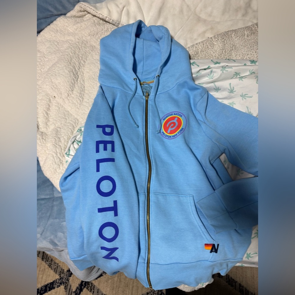 Aviator Nation Peloton Zip up hooded sweatshirt.
